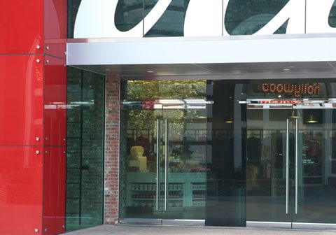 Glass entry doors with long round pull handles